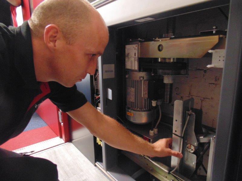 Gartec Service Engineer Examining Platform Lift