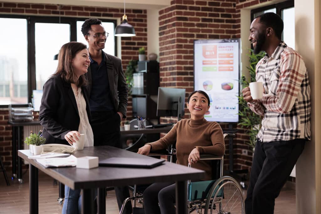 A diverse group of people taking a break in the office