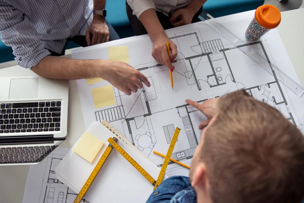 Architect working on a building plans.
